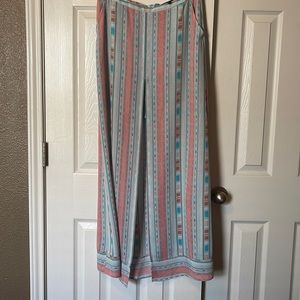 Long skirt with mini underskirt, back zip, 2 stitches in front coming loose